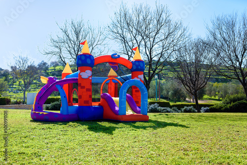 Obraz na płótnie Inflatable castle outdoor at sunny summer day.