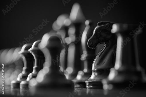 black chess pieces on the board, chess horse