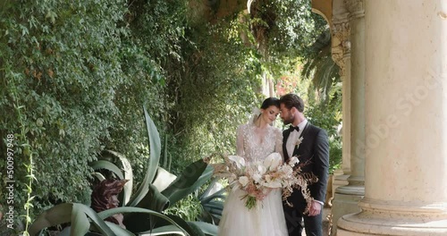 Young couple poses for wedding photoshoot in Isola Del Garda