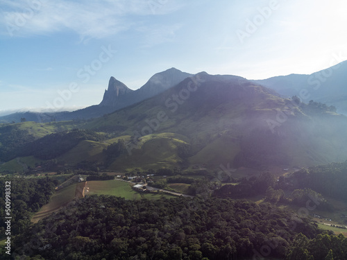 Beautiful country town with beautiful mountain on the horizon and green fields in nature - Pedra Azul, Espirito Santo, Brazil