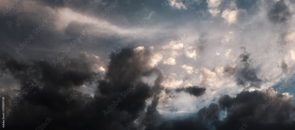 Panorama of dramatic cloudy overcast sky