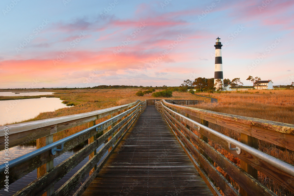 Beautiful sunrise over Bodie Island Lighthouse at Nags Head, Outer banks, North Carolina, USA. The lighthouse was built in 1872 and stands 156 ft tall and  is located on the Roanoke Sound side, NC.