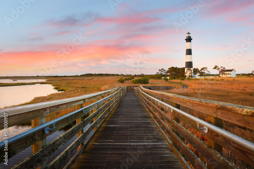 Beautiful sunrise over Bodie Island Lighthouse at Nags Head, Outer banks, North Carolina, USA. The lighthouse was built in 1872 and stands 156 ft tall and is located on the Roanoke Sound side, NC.