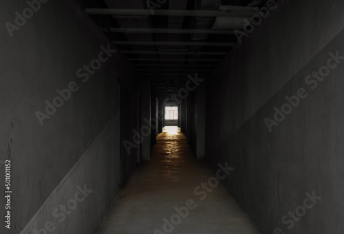 A dark long corridor at the end of the world of hope. 