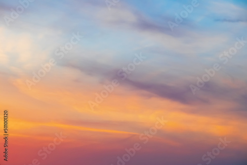 Beautiful sky background at sunset. Colorful, bright clouds in the evening