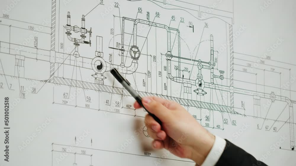 Architect designer working with plan blueprint close-up. Professional engineer showing on scheme, interior creator making architectural house project, drafting building. Architect designer working with plan blueprint close-up. Professional engineer showing on scheme, interior creator making architectural house project, drafting building.