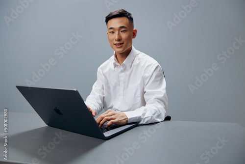 worker in a white shirt work laptop fatigue executive