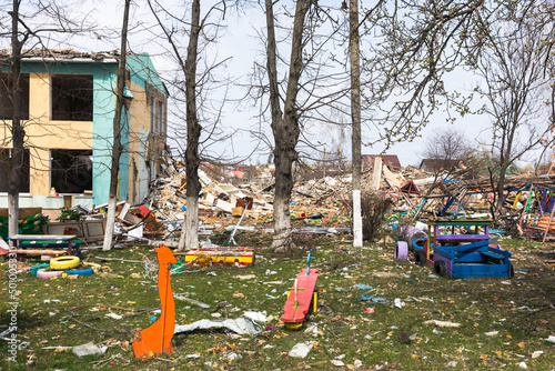 War in Ukraine. Heavily damaged kindergarten. photo