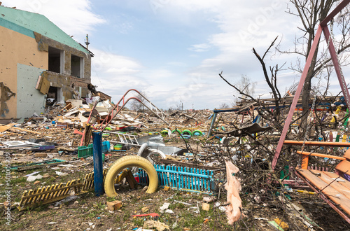 War in Ukraine. Heavily damaged kindergarten. photo