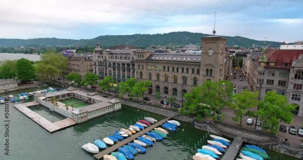 Aerial Panning Shot Of Religious Structures In Residential City Against Cloudy Sky - Zurich, Switzerland Aerial Panning Shot Of Religious Structures In Residential City Against Cloudy Sky - Zurich, Switzerland