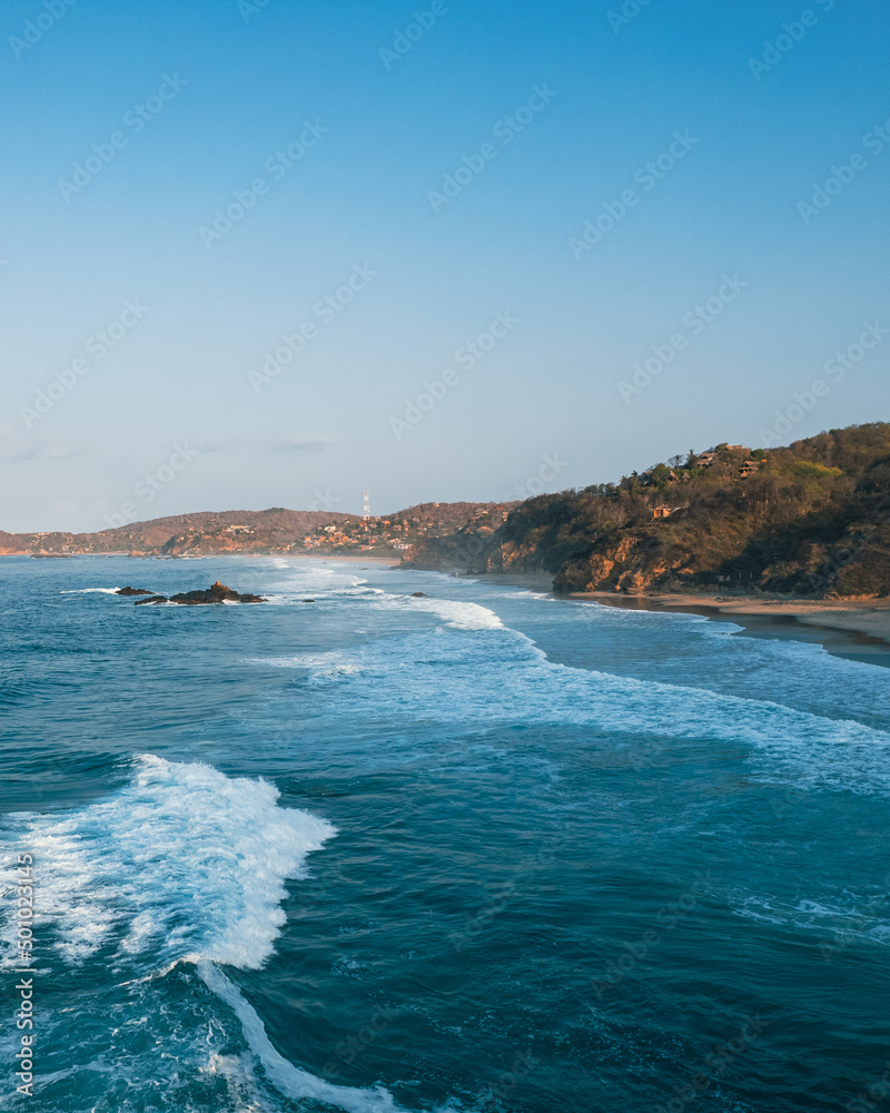 waves breaking on the rocks