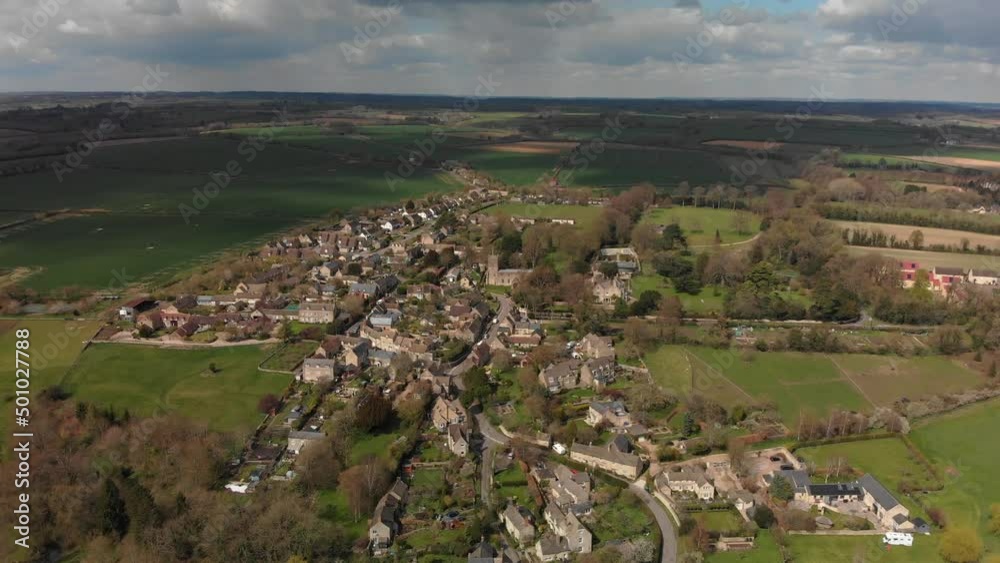 Aerial view, circling over the pretty village of Wootton in West Oxfordshire.