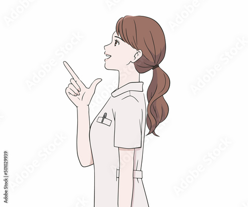 指を差す笑顔の看護師