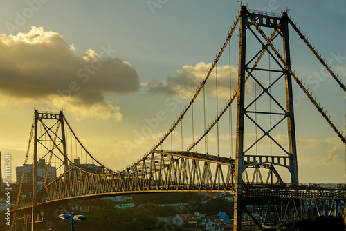 The Hercilio Luz Bridge. This bridge links the Island of Santa Catarina to the mainland. It is the longest suspension steel bridge in Brazil. This was built between 1922 to 1926. Florianópolis. 2016.