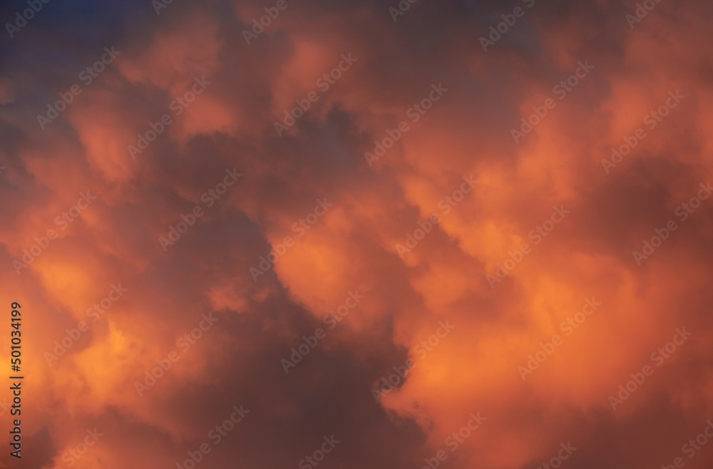 a close-up with colorful clouds at sunset