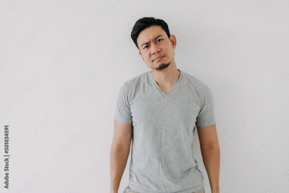 Worries face expression of Asian man who got problem isolated on white. Worries face expression of Asian man who got problem isolated on white.