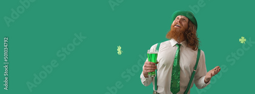 Redhead bearded man drinkin...