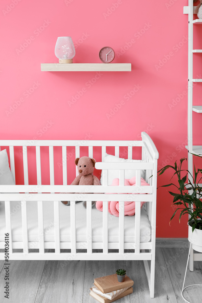 Interior of beautiful children's room with stylish decor and crib Interior of beautiful children's room with stylish decor and crib