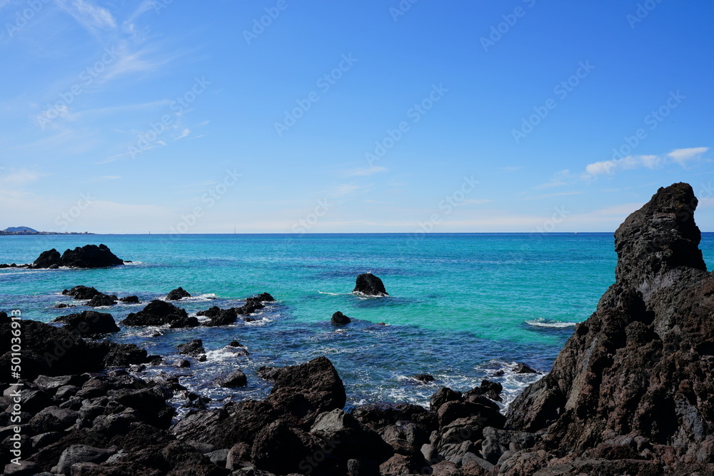 fine bluish sea and rocks