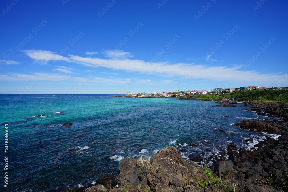 beautiful rock coast and clear bluish water