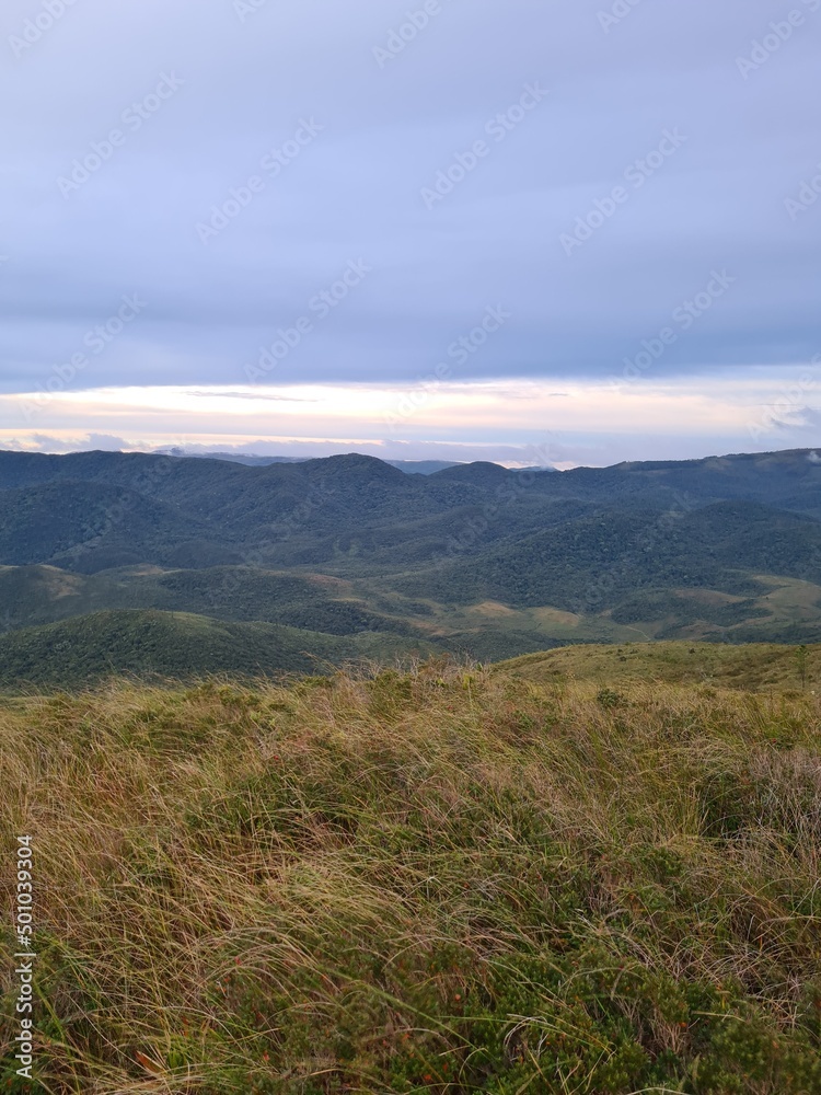 Naklejka premium clouds over the mountains