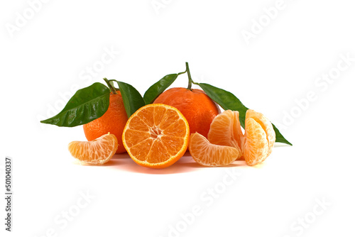 Fototapeta Naklejka Na Ścianę i Meble -  Clementine, tangerine or mandarin fruit with leaves