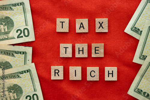 Foto Calgary, Alberta - April 24, 2022:    Tax the rich concept based on american politics and AOC - Alexandria Ocasio-Cortez