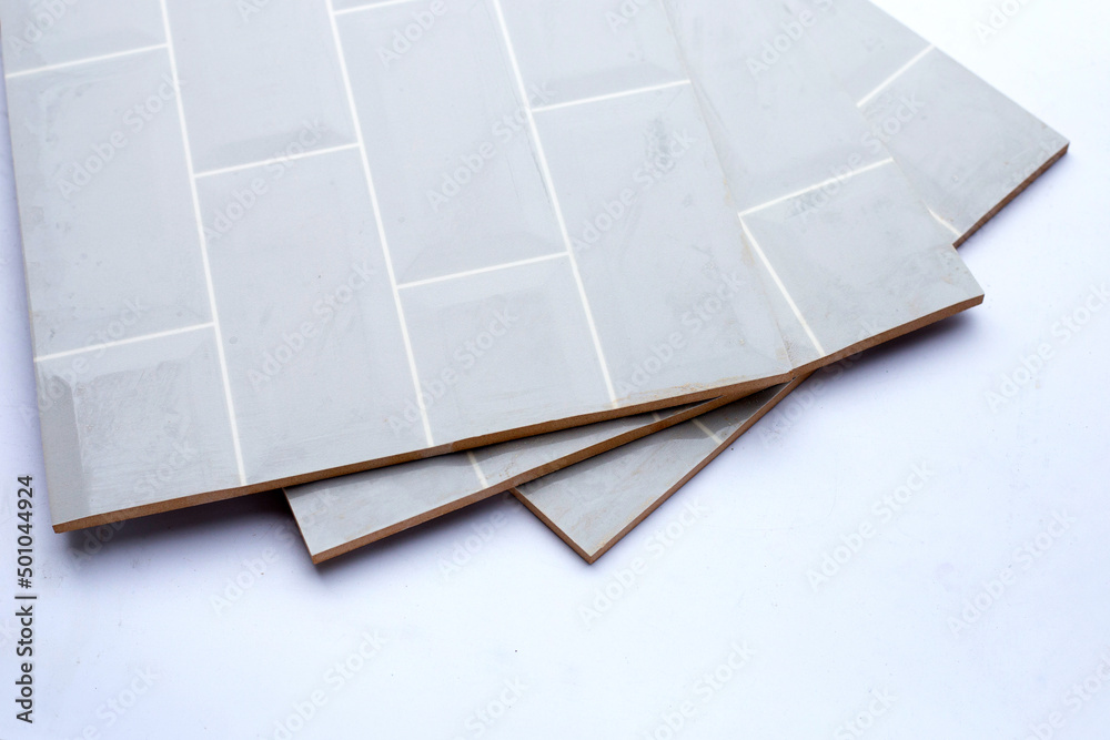 Pile of wall tiles on white background. Pile of wall tiles on white background.
