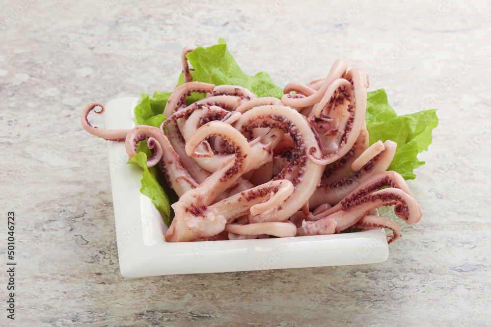 Marinated squid tentacles in the bowl