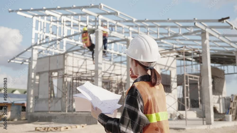 Back one architect standing outdoor at home building construction site Back one architect standing outdoor at home building construction site