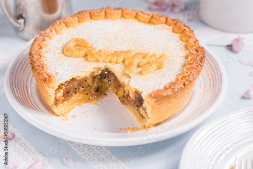 Gooseberry pie with Grumpy sign on it, popular dish from fairytale Snow white and seven dwarfs