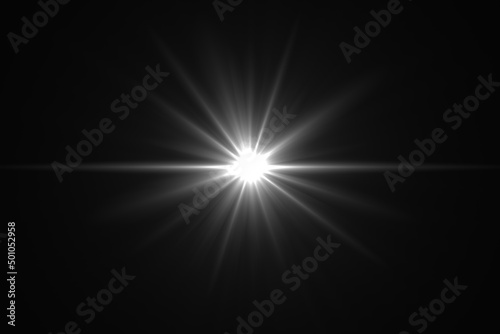 Lens flare glow light effect on black background.