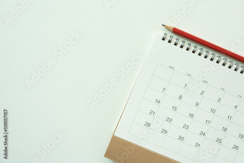 close up of calendar on the whitew table background, planning for business meeting or travel planning concept photo