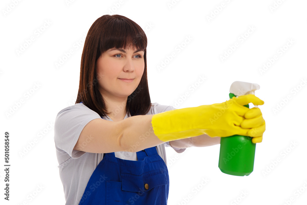 young female cleaner in blue uniform holding detergent spray isolated on white young female cleaner in blue uniform holding detergent spray isolated on white