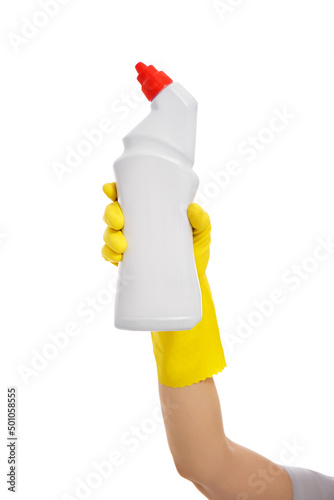 hand in yellow rubber glove holding plastic bottle with toilet cleaner isolated on white