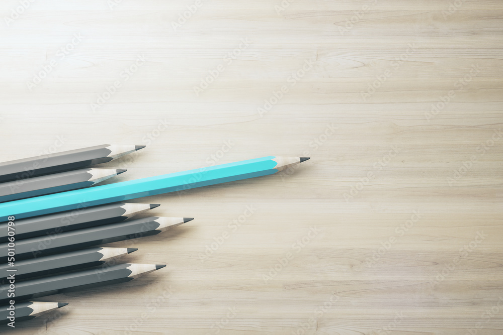 Obraz premium Concept of creativity, innovation, idea, crisis management and solution. One blue pencil standing out of line with similar ones, clean mock up space on wooden background. 3D Rendering.