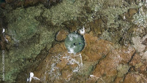 A natural pool is hewn in a natural rock near the shoreline of Haifa, Israel. photo