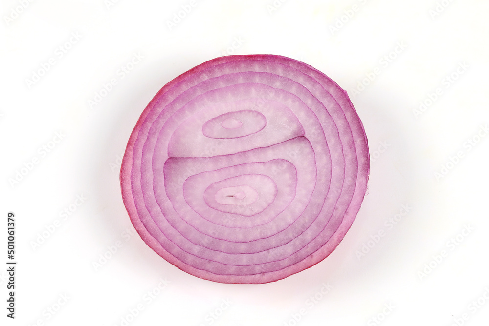 red onion, sliced into rings, close-up on white background It is a vegetable that can be eaten raw, top view.