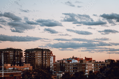 Cityscape of upscale luxury neighborhood in Madrid. Arturo Soria area. View at sunset. Real estate and residential market concept