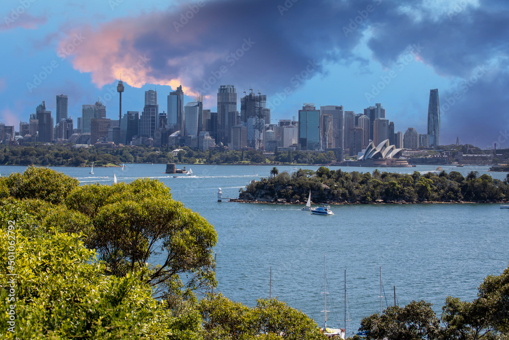 Sydney CBD skyline, residential and commercial buildings on the harbour waters NSW Australia