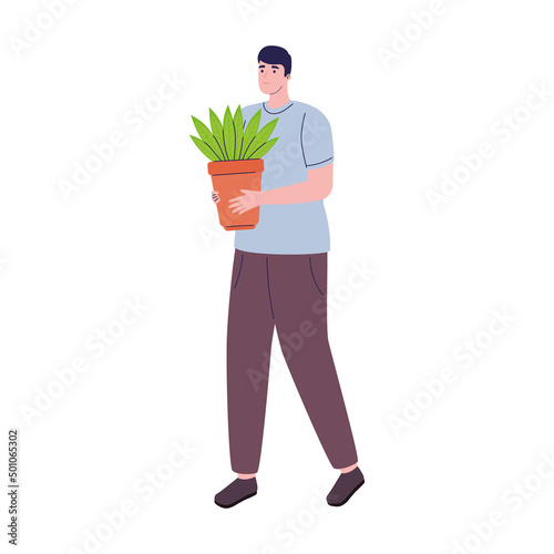 man lifting houseplant