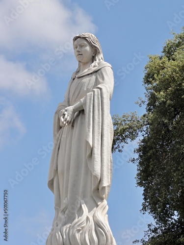 Little woman statue in a Merida park  Extremadura - Spain 