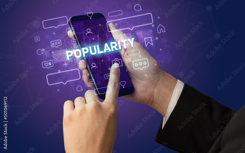Hand using smartphone with social media concept Hand using smartphone with social media concept