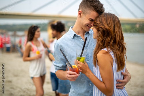 Portrait of happy couple in love having fun on vacation party. Travel people happiness concept