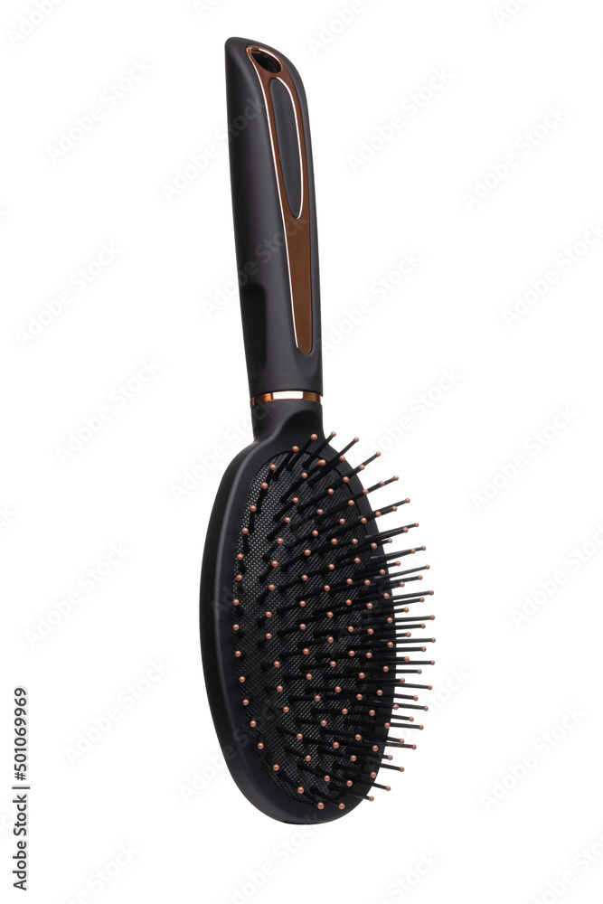 Hairbrush isolated on white background. Black and gold hair brush cut out. Design element. Personal grooming accessory Hairbrush isolated on white background. Black and gold hair brush cut out. Design element. Personal grooming accessory