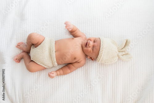 Photos Adorable infant 0-1month fussy screaming unhappy angry