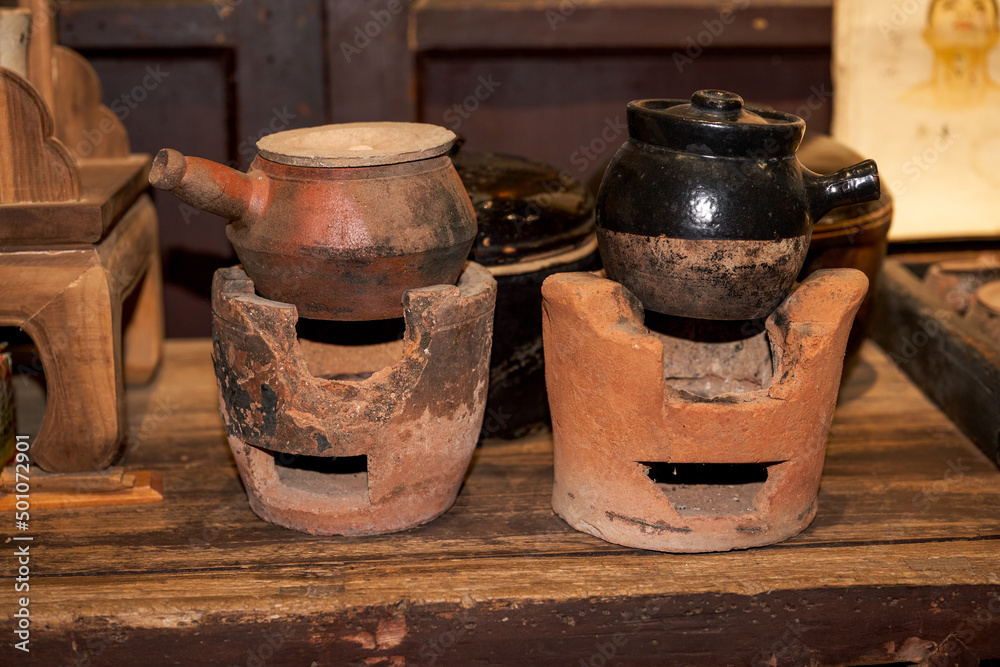 Traditional Chinese medicine pot for decoction of Chinese medicine in a Chinese herbal medicine shop Traditional Chinese medicine pot for decoction of Chinese medicine in a Chinese herbal medicine shop