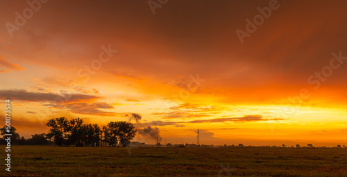 view of the fiery beautiful sunset during the fall evening. beautiful colors of the sky