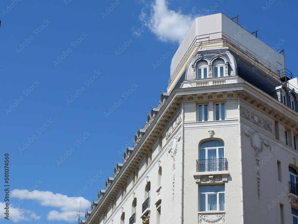 Corner of neoclassical elegant building in Barrio de las letras district downtown Madrid, Spain Corner of neoclassical elegant building in Barrio de las letras district downtown Madrid, Spain