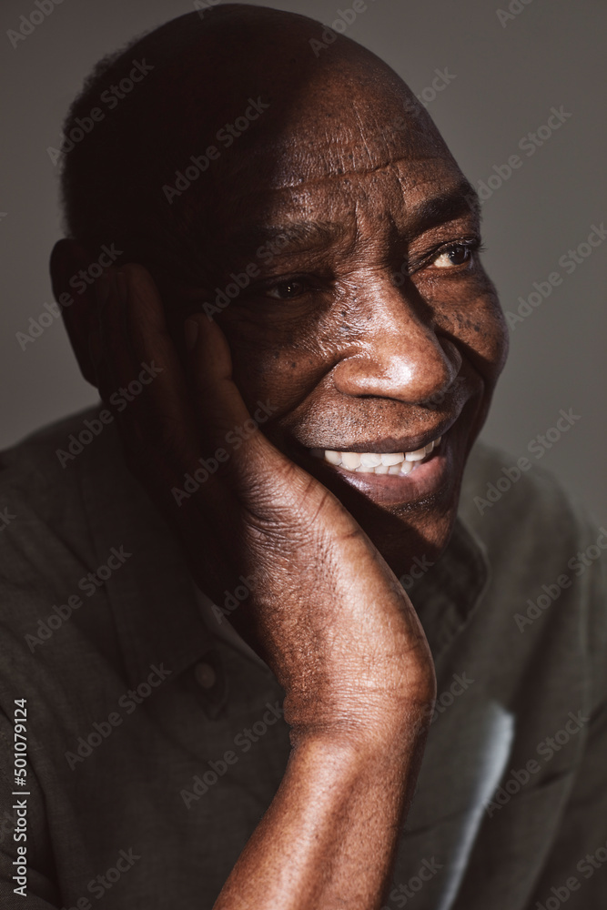 Contemplative senior man at studio